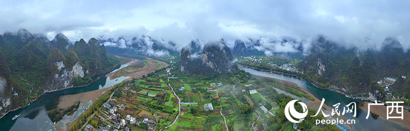 煙雨漓江如詩(shī)如畫。人民網(wǎng) 付華周攝