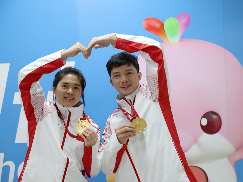 黃夢萍與丈夫為廣西奪得2025殘?zhí)貖W會首金。受訪者供圖